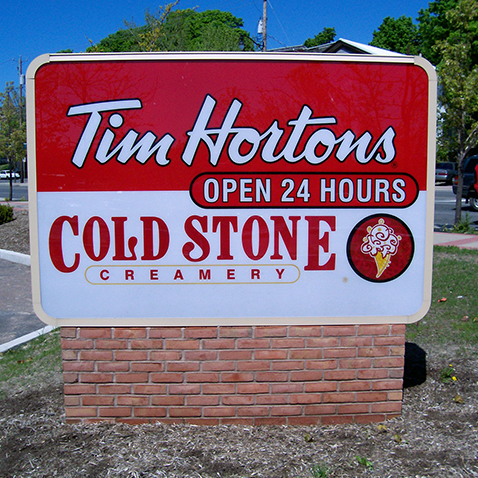 Exterior restaurant sign example.