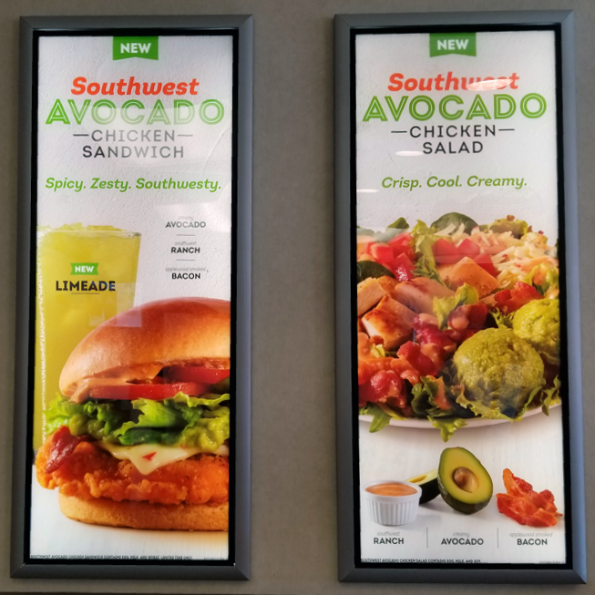 Framed mounted interior product signs.
